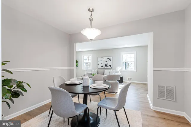 a kitchen with appliances cabinets and a sink