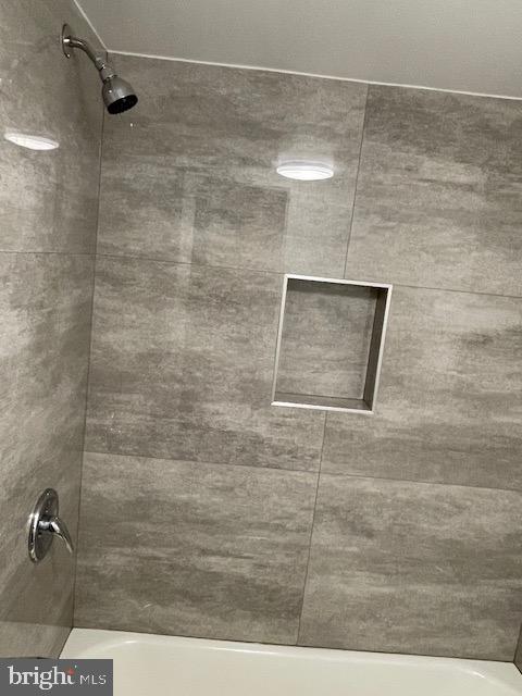1836 Metzerott Road, Unit 1516 Hyattsville, MD 20783 - Photo 2 of 26 a bathroom with a shower