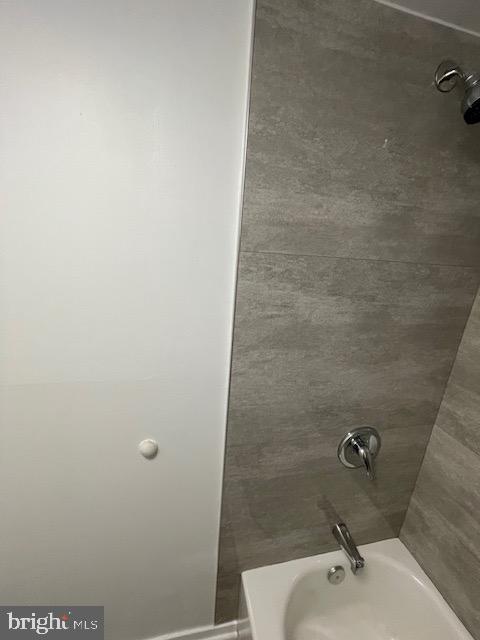 1836 Metzerott Road, Unit 1516 Hyattsville, MD 20783 - Photo 3 of 26 a bathroom with a sink and mirror