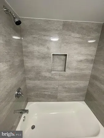a bathroom with a tub
