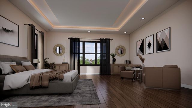 a living room with fireplace furniture and a wooden floor