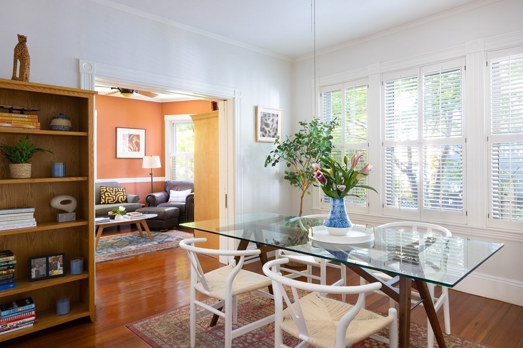 42 Stanton Road, Unit 1 Brookline, MA 02445 - Photo 3 of 16 a dining room with furniture and a potted plant