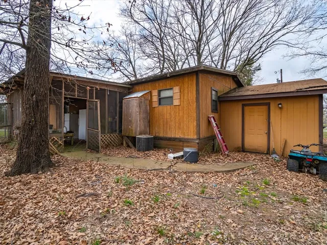 a backyard of a house with lots of green space