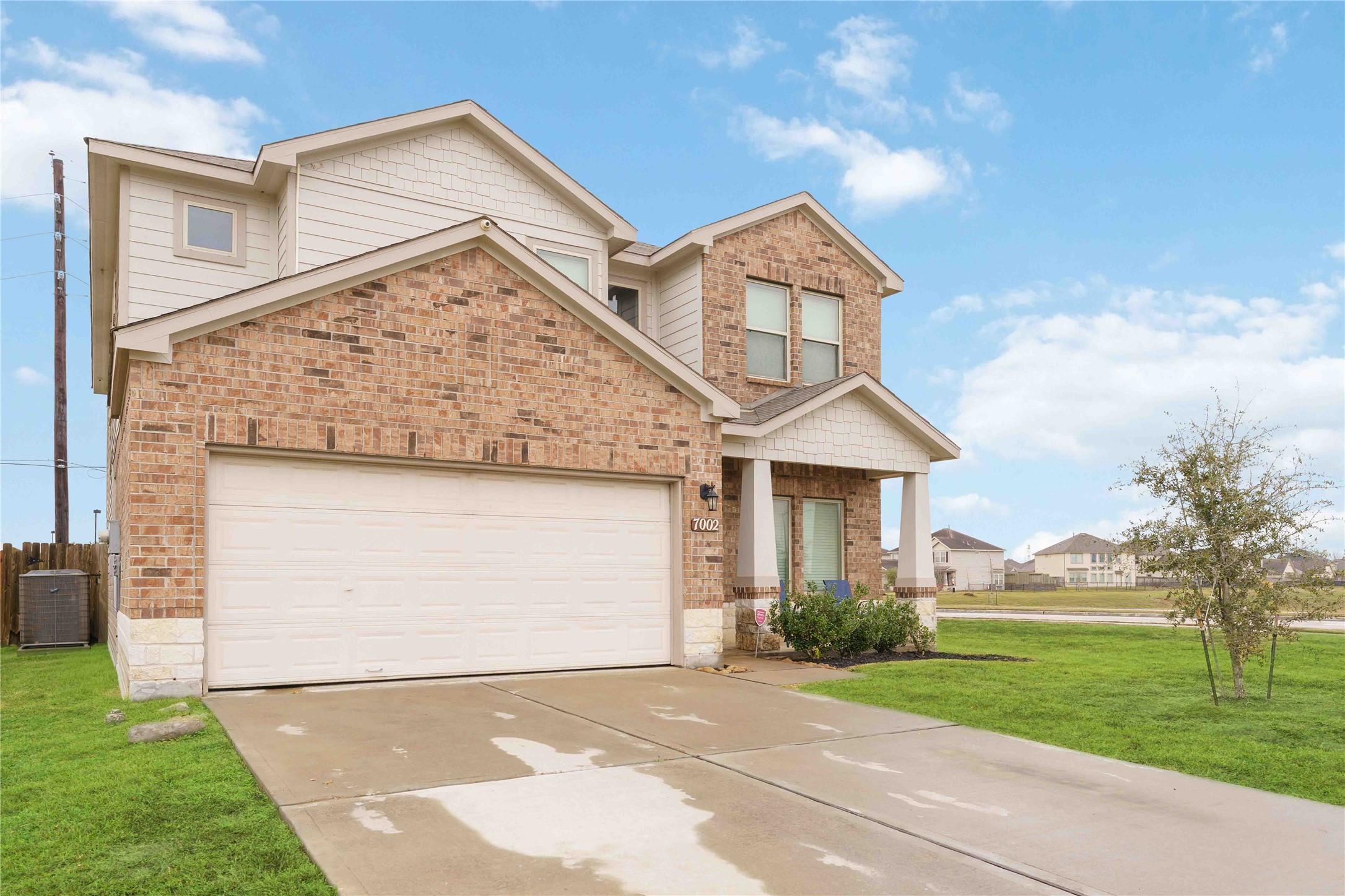 7002 Victorville Drive Rosharon, TX 77583 - Photo 2 of 27 a view of a house with a yard