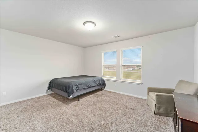 a living room with a couch and a table
