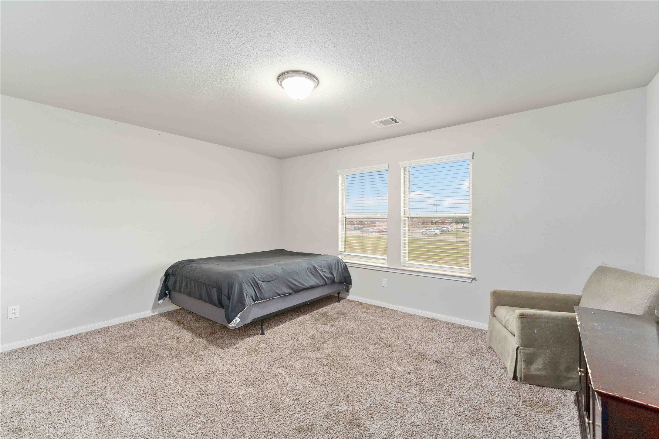 7002 Victorville Drive Rosharon, TX 77583 - Photo 21 of 27 a living room with a couch and a table