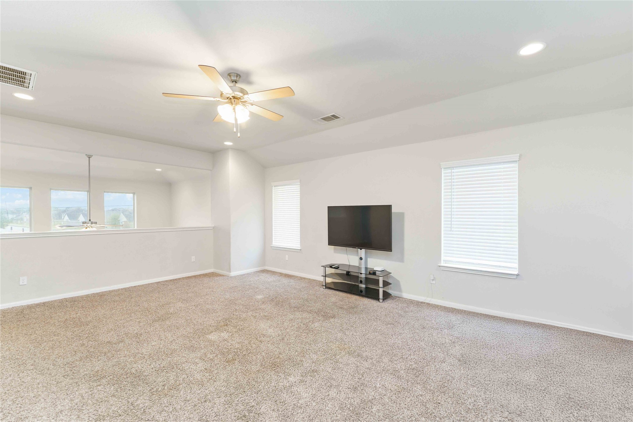 7002 Victorville Drive Rosharon, TX 77583 - Photo 24 of 27 a view of work space with furniture and a window