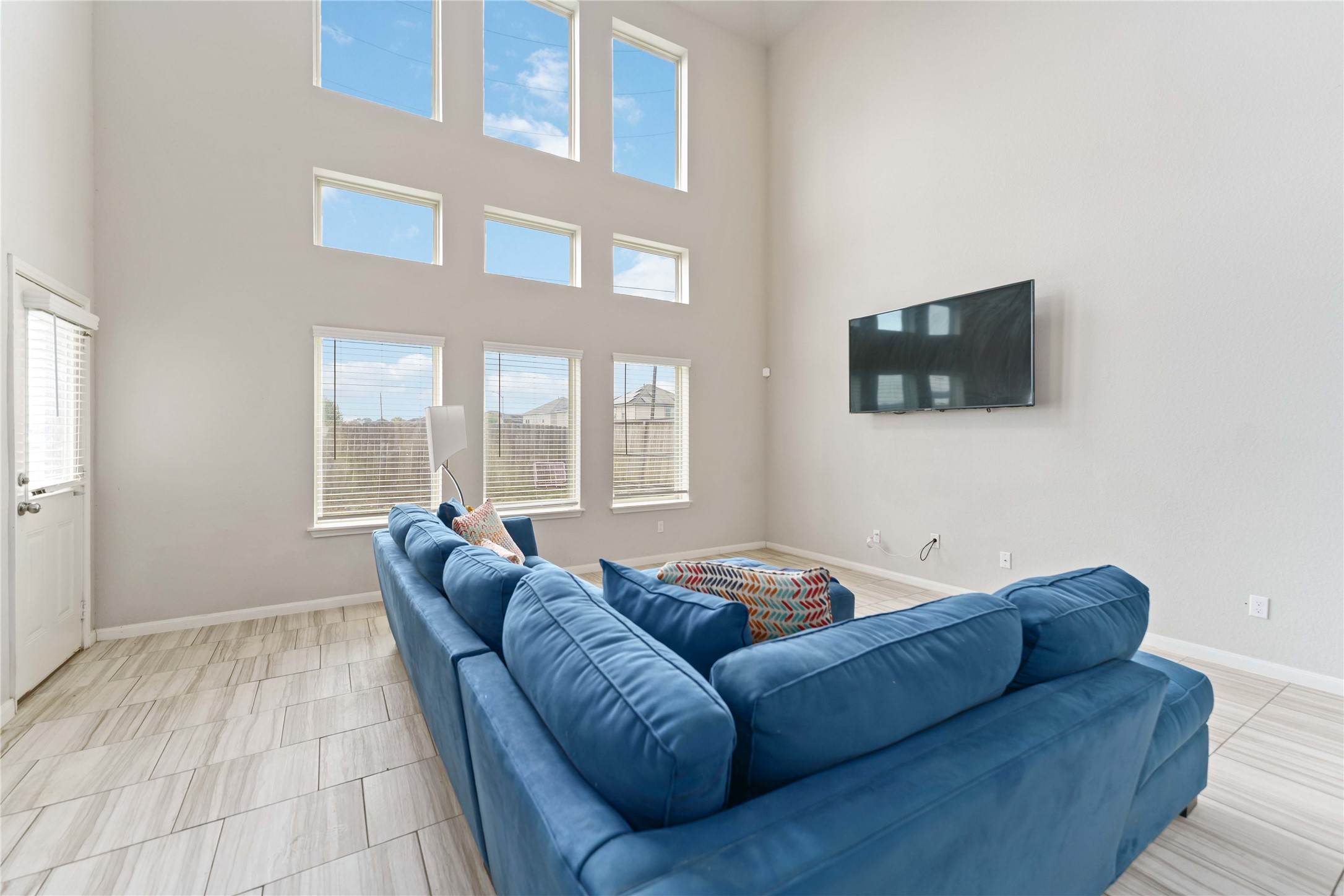 7002 Victorville Drive Rosharon, TX 77583 - Photo 4 of 27 a living room with furniture and a flat screen tv