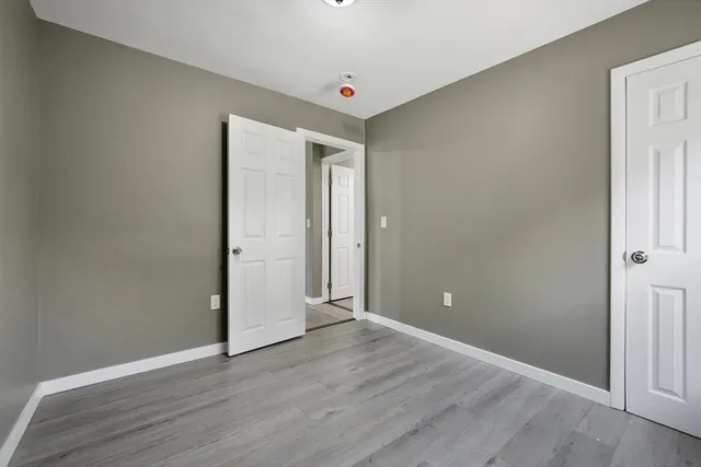 a kitchen with a refrigerator stove and sink