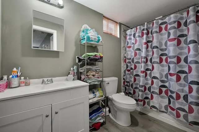 a living room with furniture a couch and a dining table