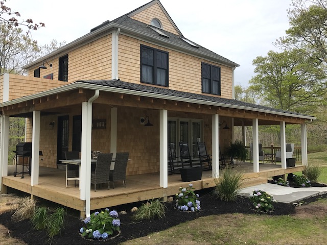 95 Whalers Walk Edgartown, MA 02539 - Photo 2 of 33 a view of a house with sitting area and garden