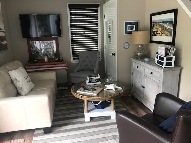 95 Whalers Walk Edgartown, MA 02539 - Photo 25 of 33 a living room with furniture and a window