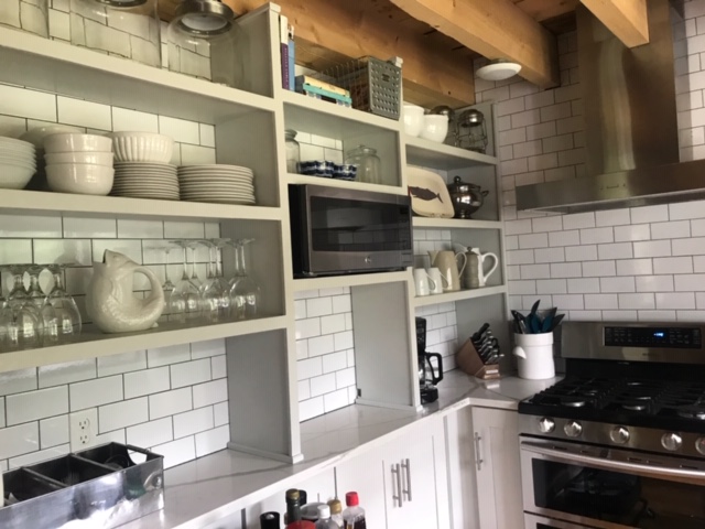 95 Whalers Walk Edgartown, MA 02539 - Photo 7 of 33 a kitchen with a stove and a microwave