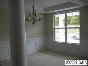1037 Ridgehaven Road Waxhaw, NC 28173 - Photo 3 of 8 a picture of a room that has a window in it