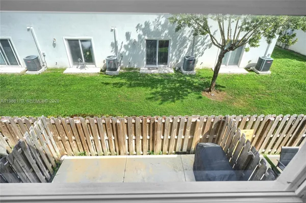 a bedroom with bed and window