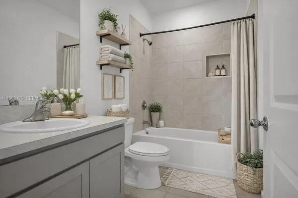 a view of a hallway with wooden shelves