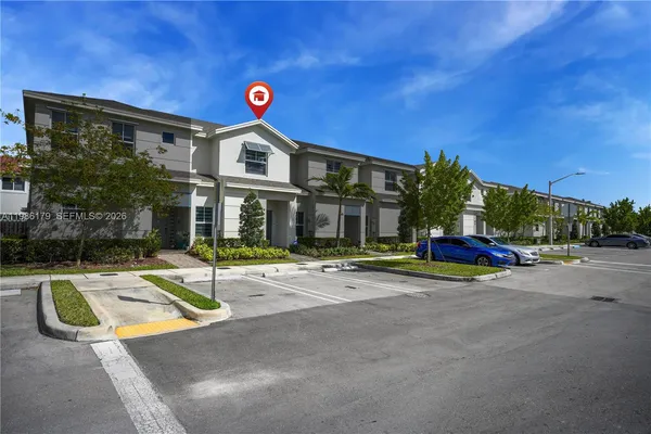 a view of a patio with swimming pool