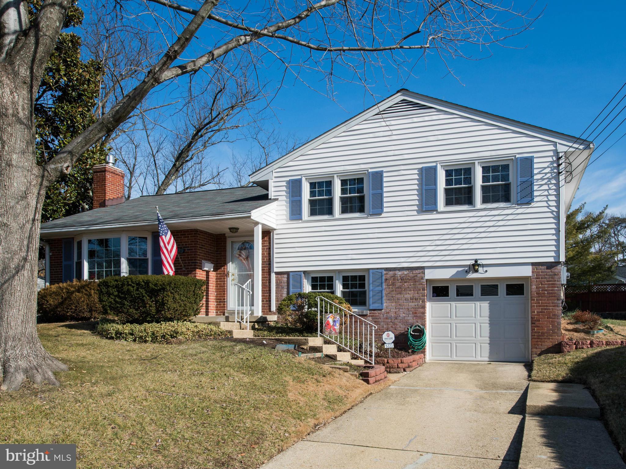 5223 Cather Road Springfield, VA 22151 - Photo 1 of 22 a front view of a house with patio