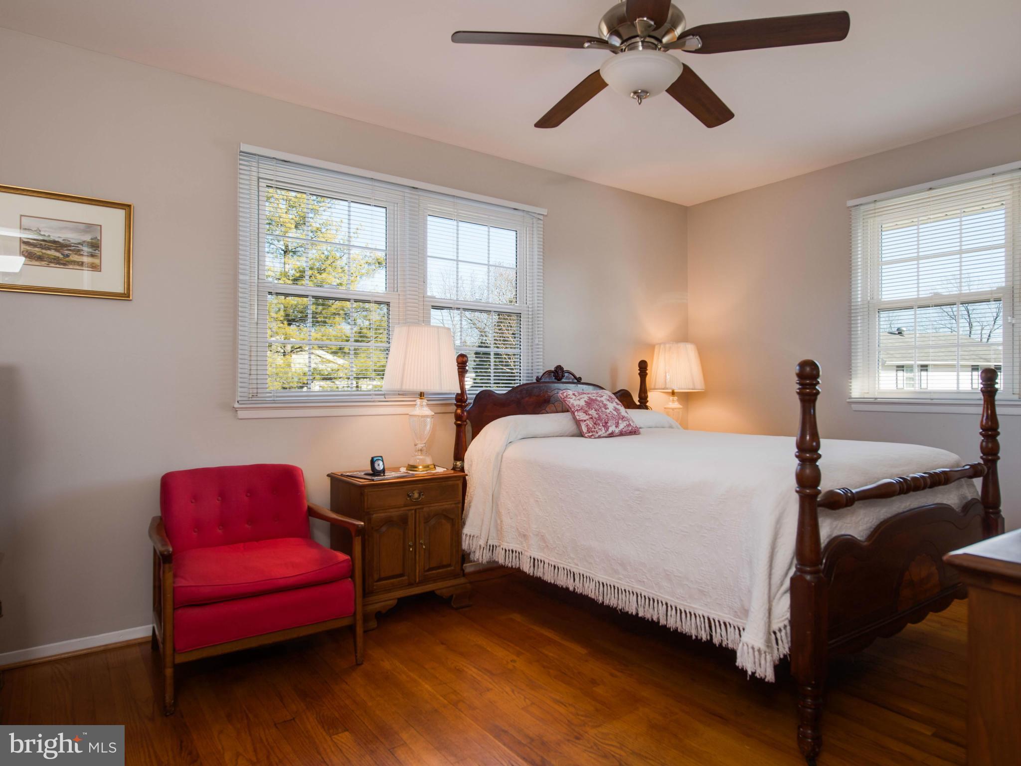 5223 Cather Road Springfield, VA 22151 - Photo 10 of 22 a bedroom with two beds and a window