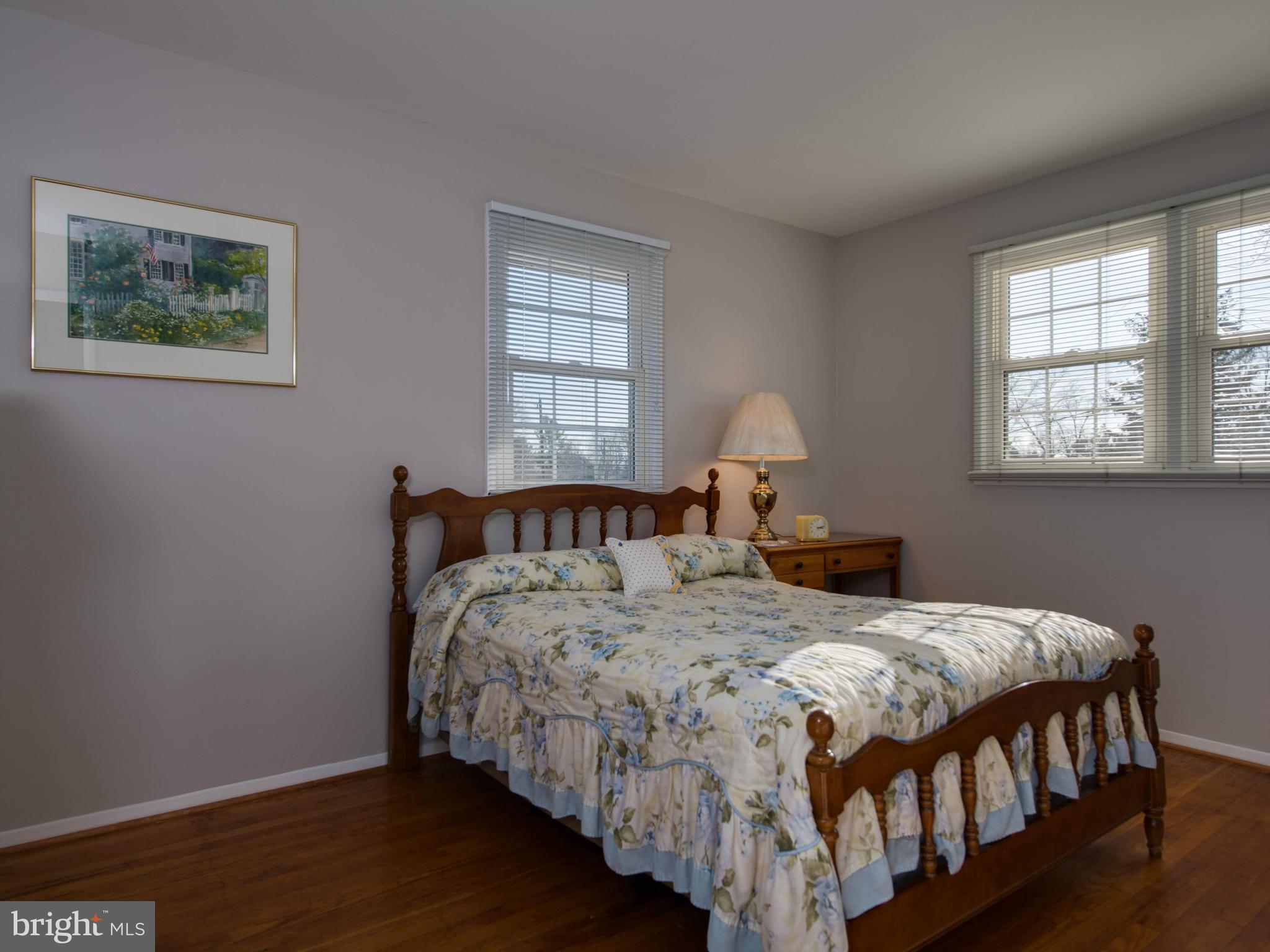 5223 Cather Road Springfield, VA 22151 - Photo 11 of 22 a bedroom with bed and a window