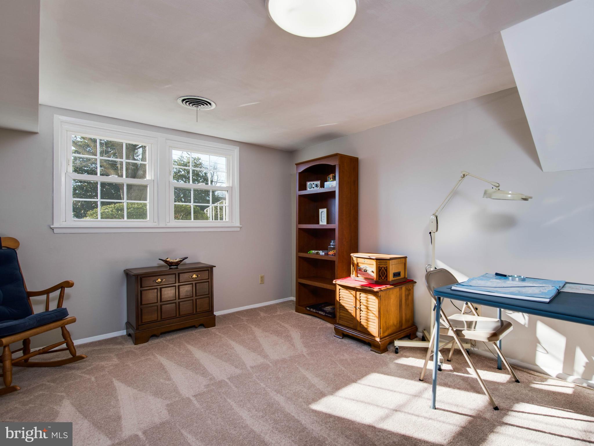 5223 Cather Road Springfield, VA 22151 - Photo 14 of 22 a living room with furniture and a window
