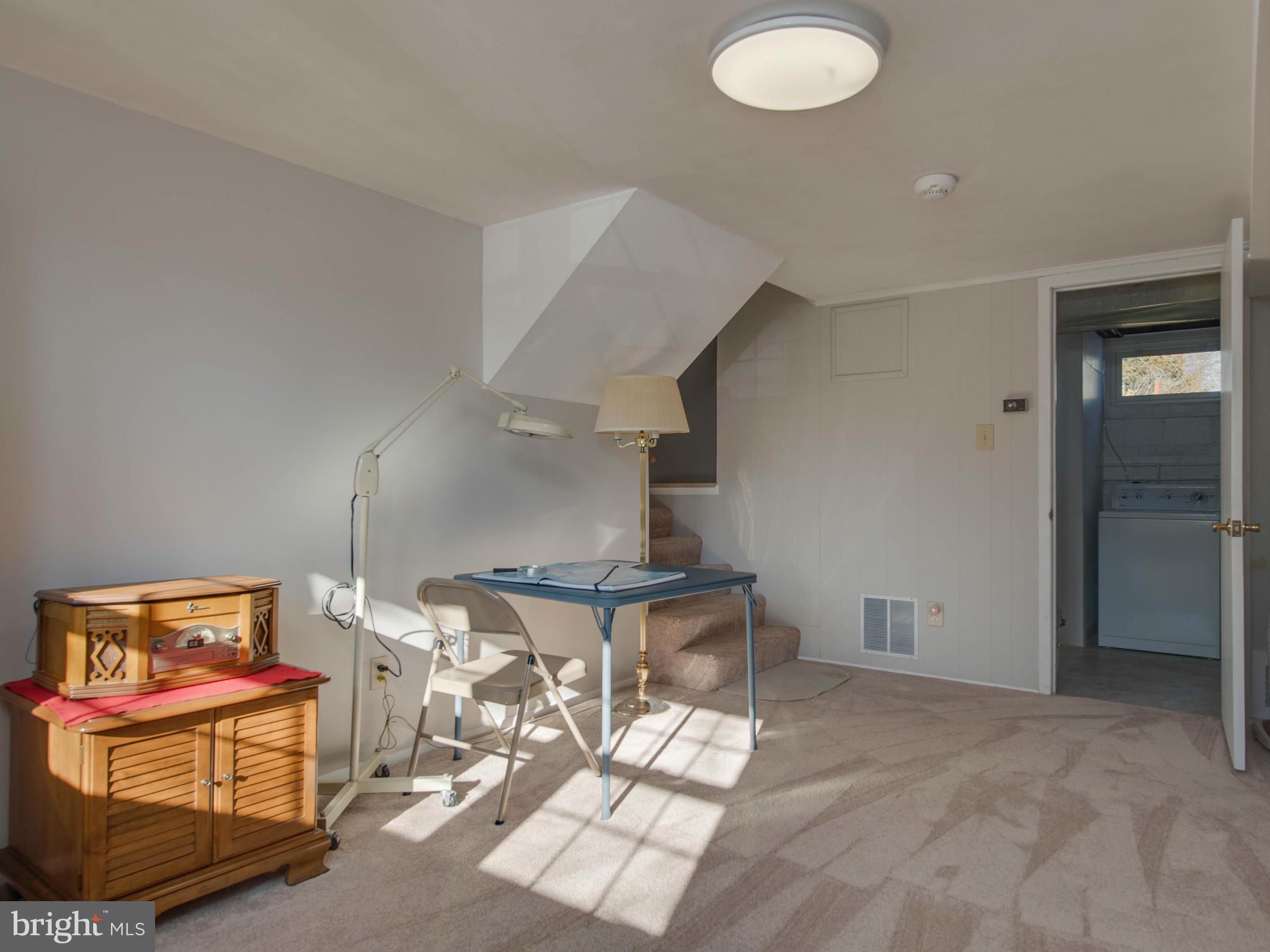 5223 Cather Road Springfield, VA 22151 - Photo 15 of 22 a view of a room with gym equipment