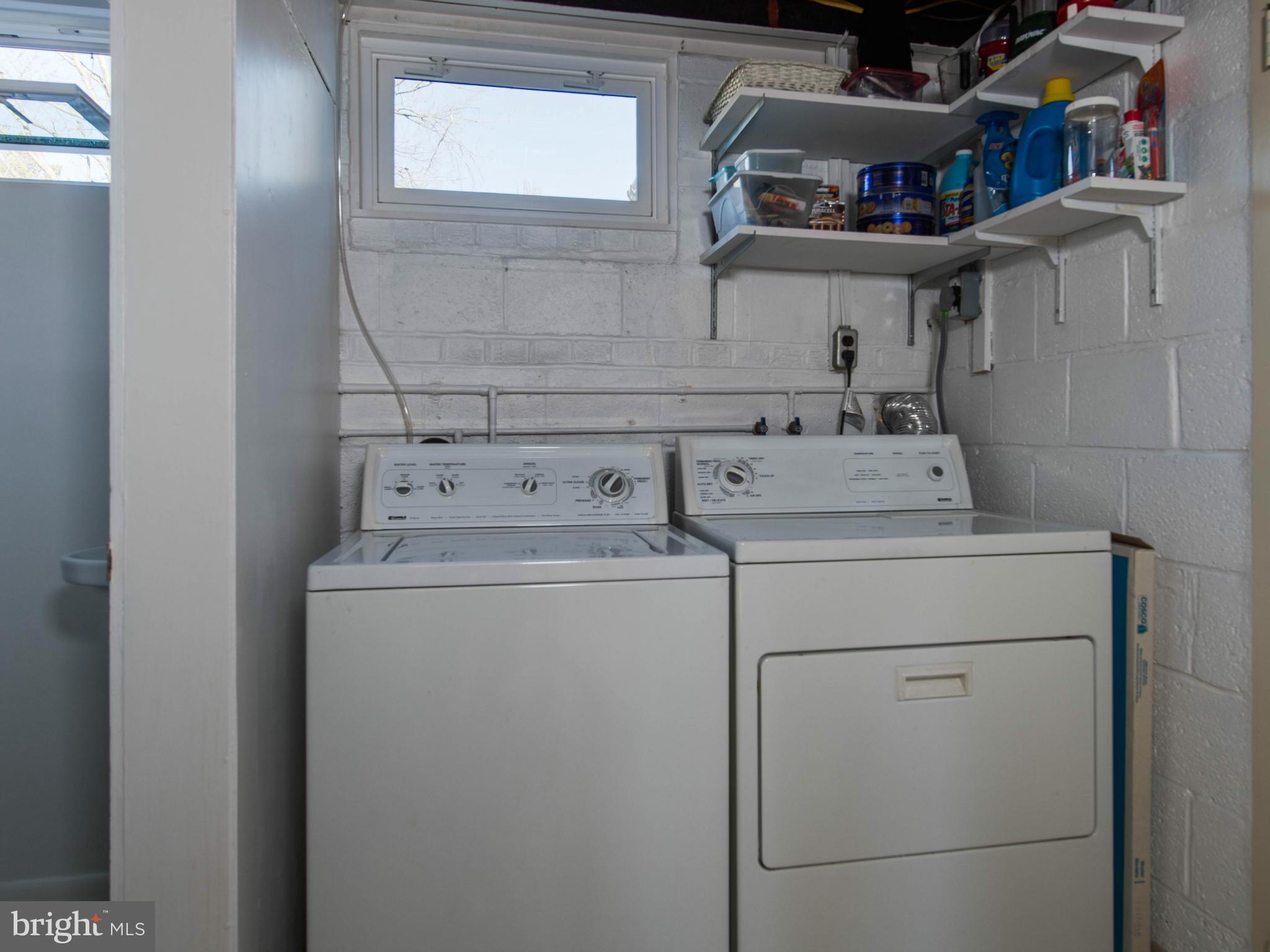 5223 Cather Road Springfield, VA 22151 - Photo 16 of 22 a utility room with dryer and washer
