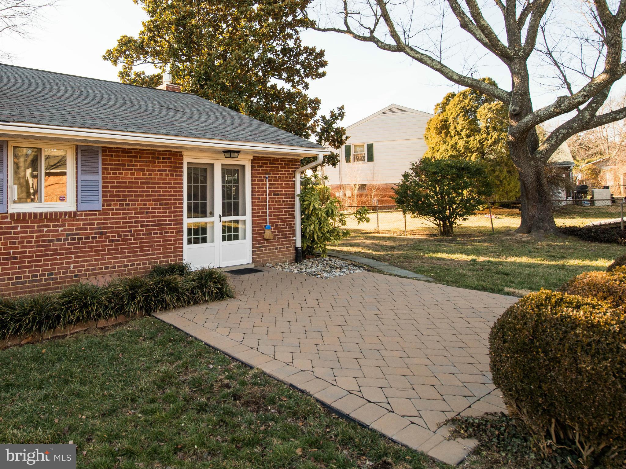 5223 Cather Road Springfield, VA 22151 - Photo 18 of 22 a view of a house with a yard and tree