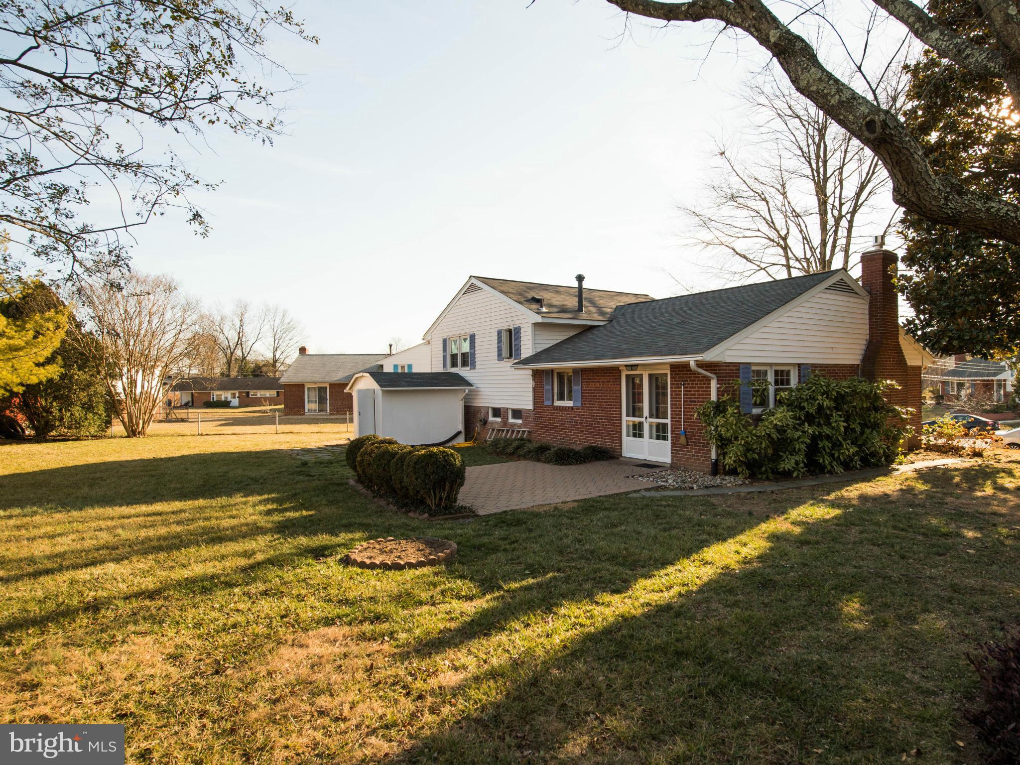 5223 Cather Road Springfield, VA 22151 - Photo 19 of 22 a front view of a house with a yard