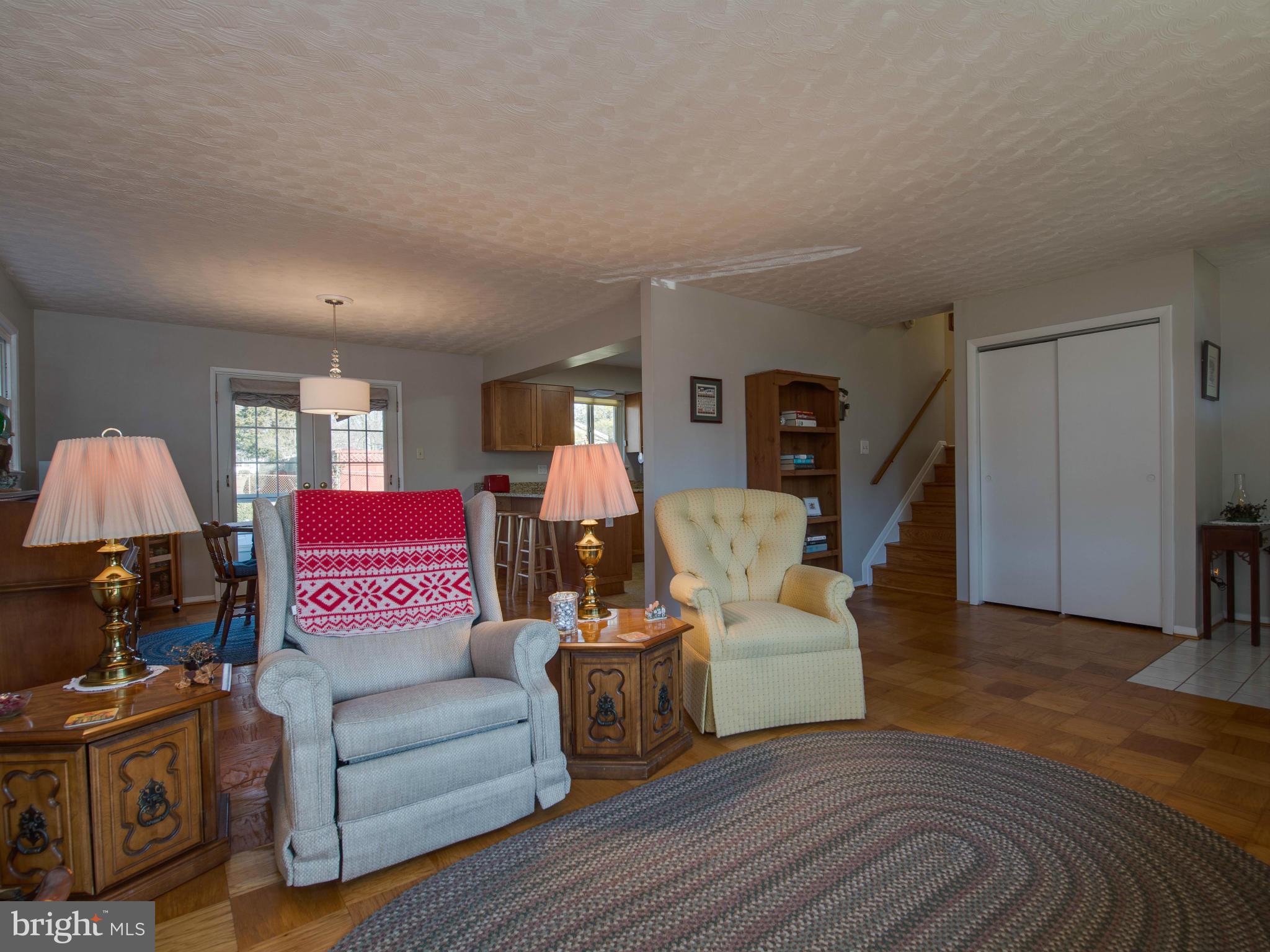 5223 Cather Road Springfield, VA 22151 - Photo 5 of 22 a living room with furniture and a wooden floor