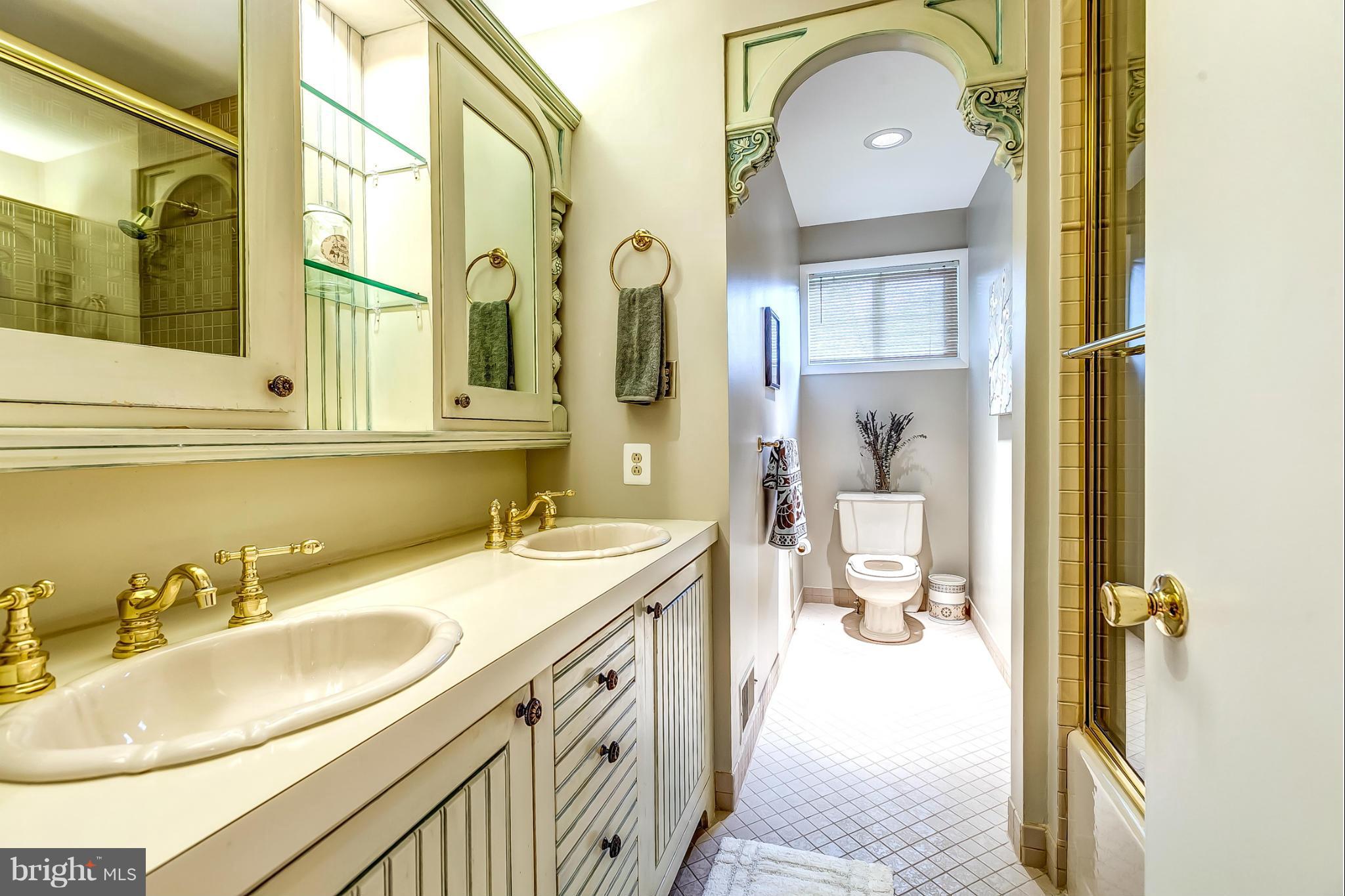 2104 Burdock Road Baltimore, MD 21209 - Photo 19 of 30 Bathroom with Double Vanities