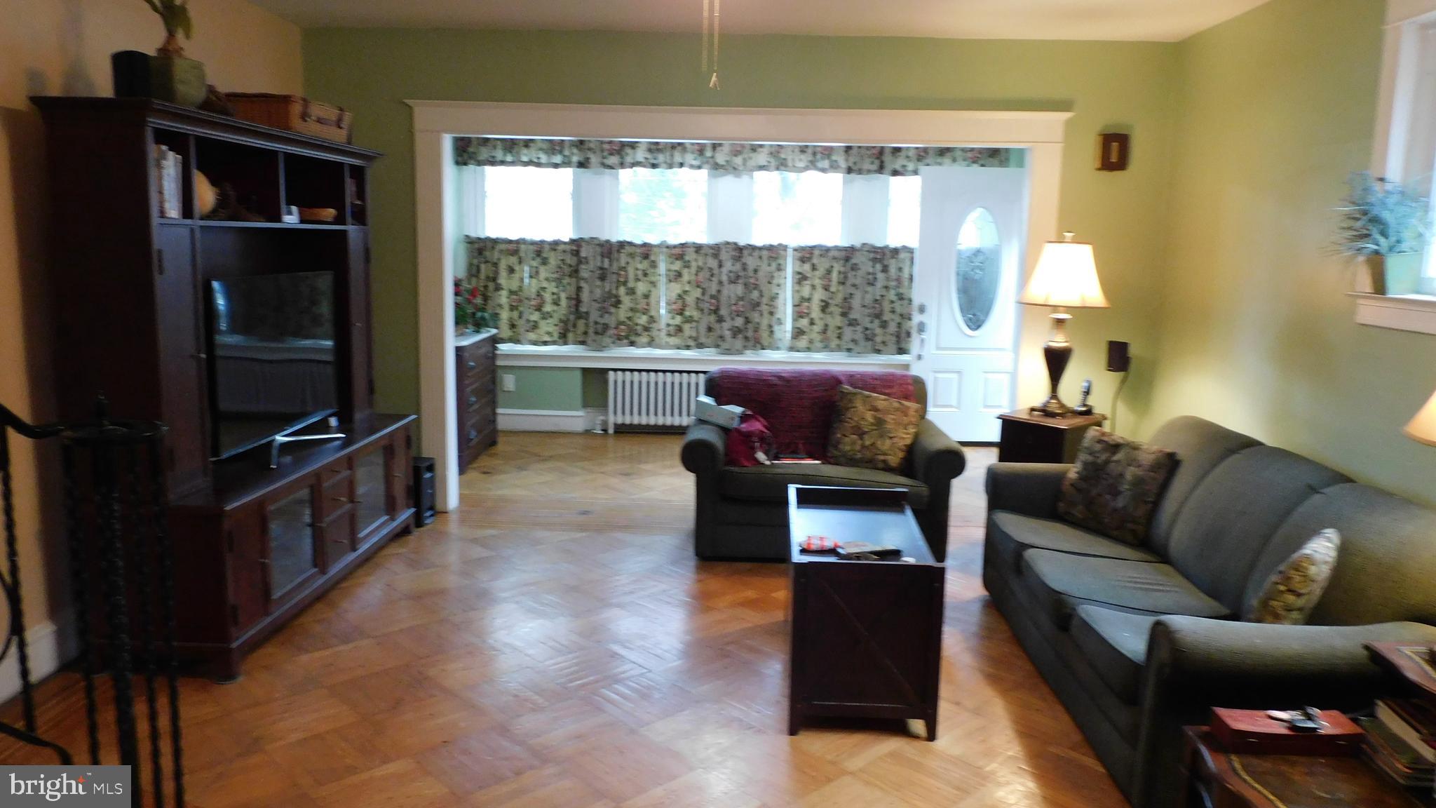 3227 Fuller Street Philadelphia, PA 19136 - Photo 11 of 27 View through living room into sun parlor