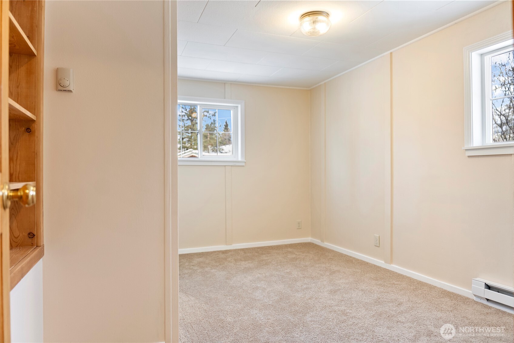 146 East Chewuch Road Winthrop, WA 98862 - Photo 22 of 39 a view of an empty room with a window