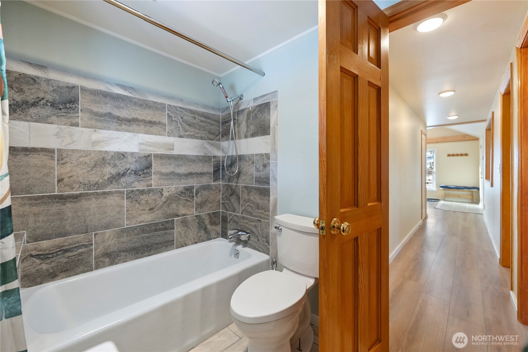 146 East Chewuch Road Winthrop, WA 98862 - Photo 23 of 39 a bathroom with a granite countertop bathtub shower sink vanity and toilet
