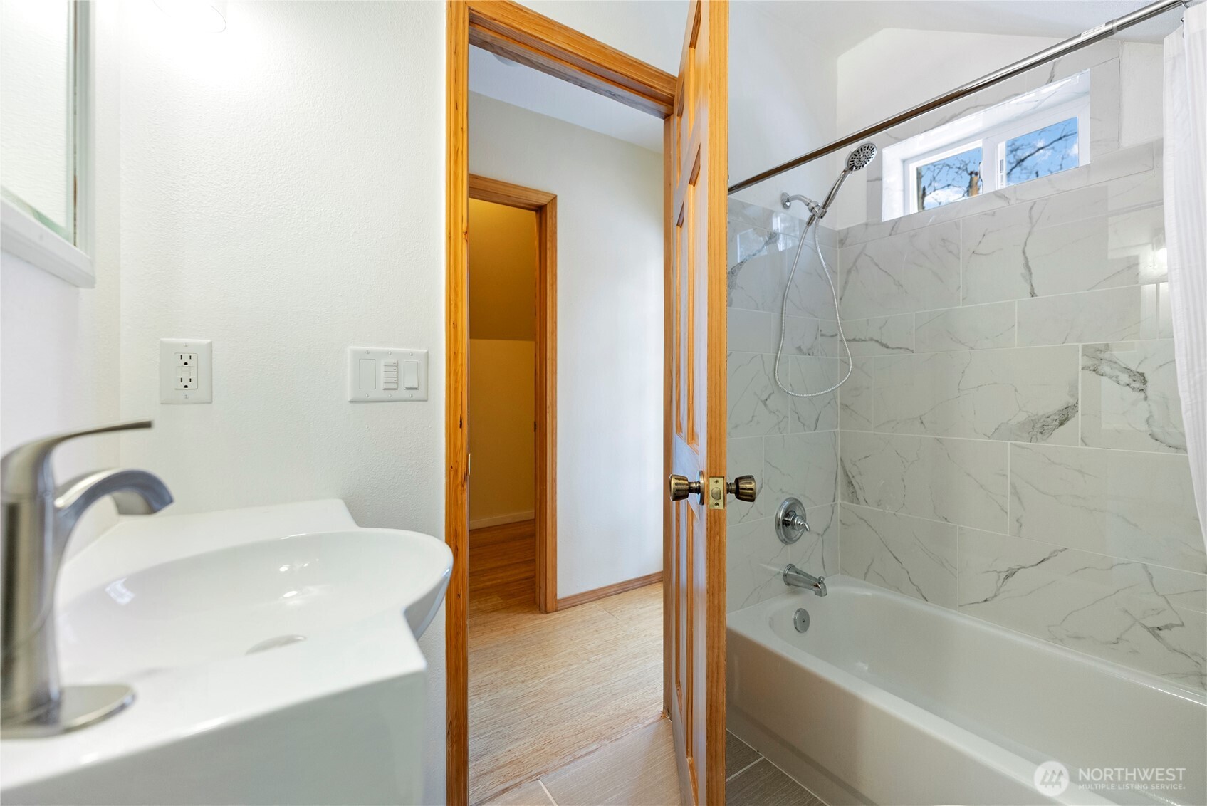 146 East Chewuch Road Winthrop, WA 98862 - Photo 37 of 39 a bathroom with a sink a mirror and a bathtub