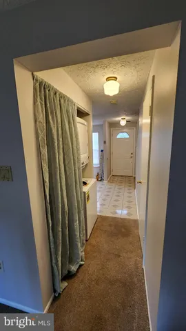 a bathroom with a sink toilet and mirror