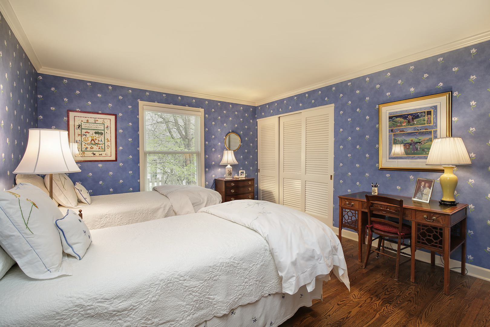 1115 West Deerpath Road Lake Forest, IL 60045 - Photo 11 of 18 a spacious bedroom with a bed and a table in it