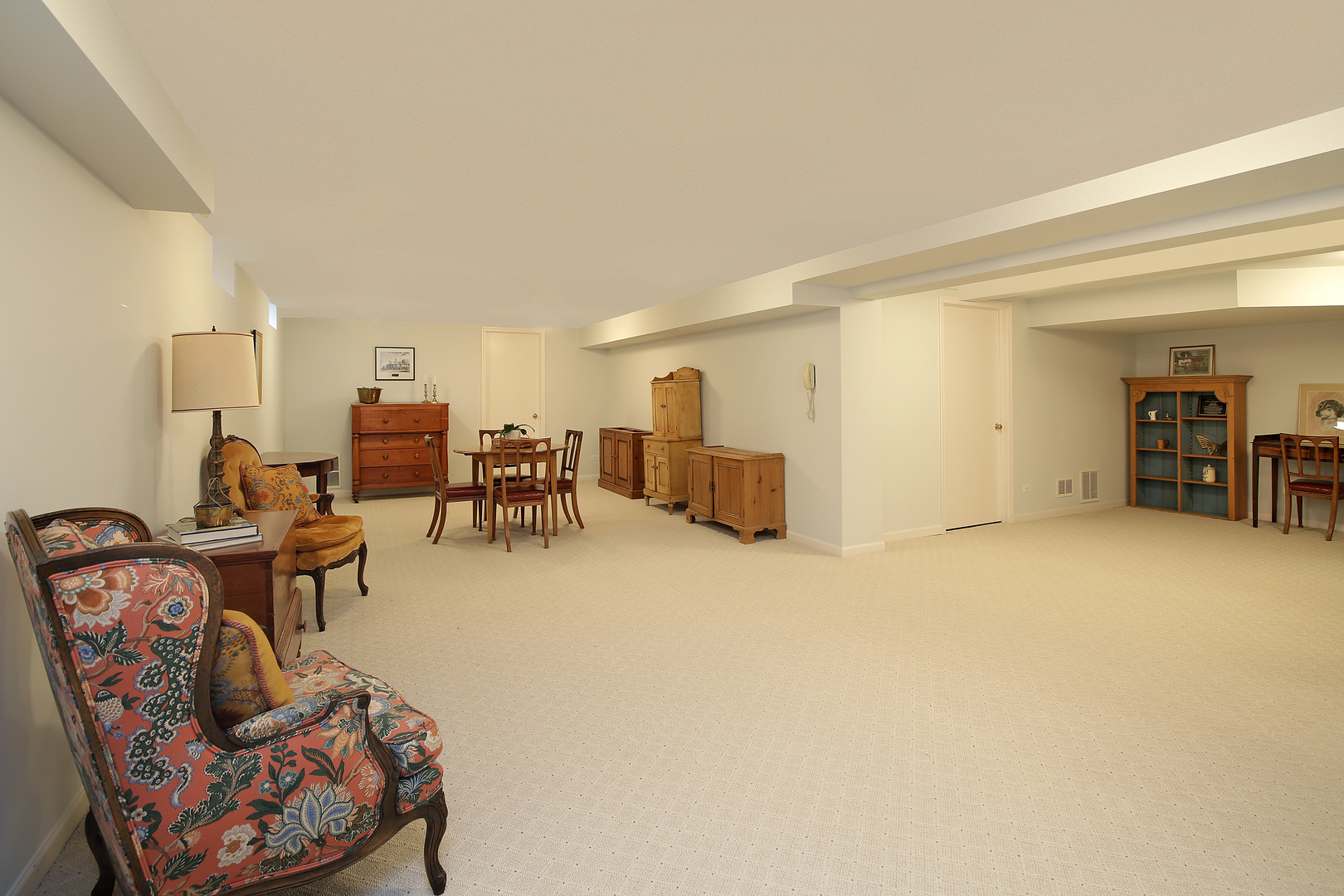 1115 West Deerpath Road Lake Forest, IL 60045 - Photo 14 of 18 a living room with furniture a dining table and chairs