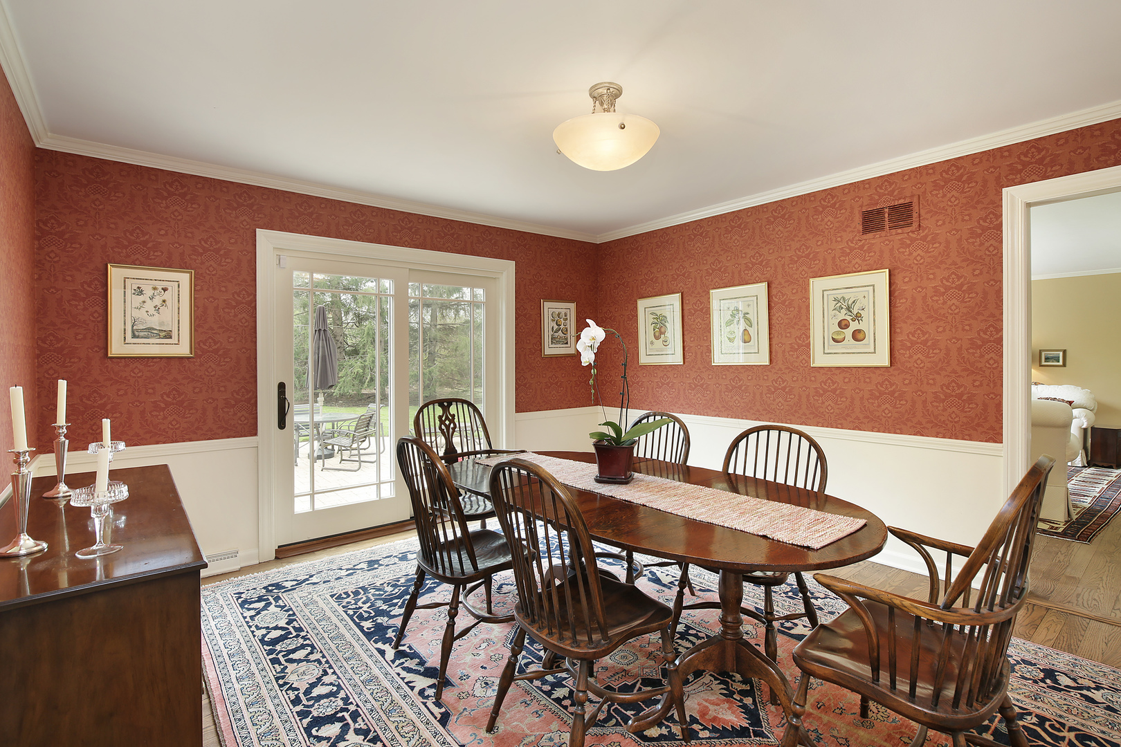 1115 West Deerpath Road Lake Forest, IL 60045 - Photo 5 of 18 a view of a dining room with furniture and wooden floor