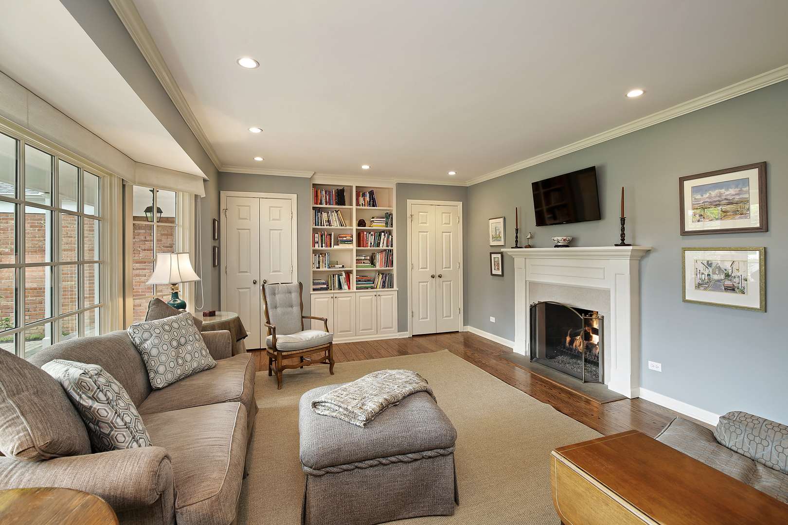 1115 West Deerpath Road Lake Forest, IL 60045 - Photo 7 of 18 a living room with furniture or fireplace and a flat screen tv