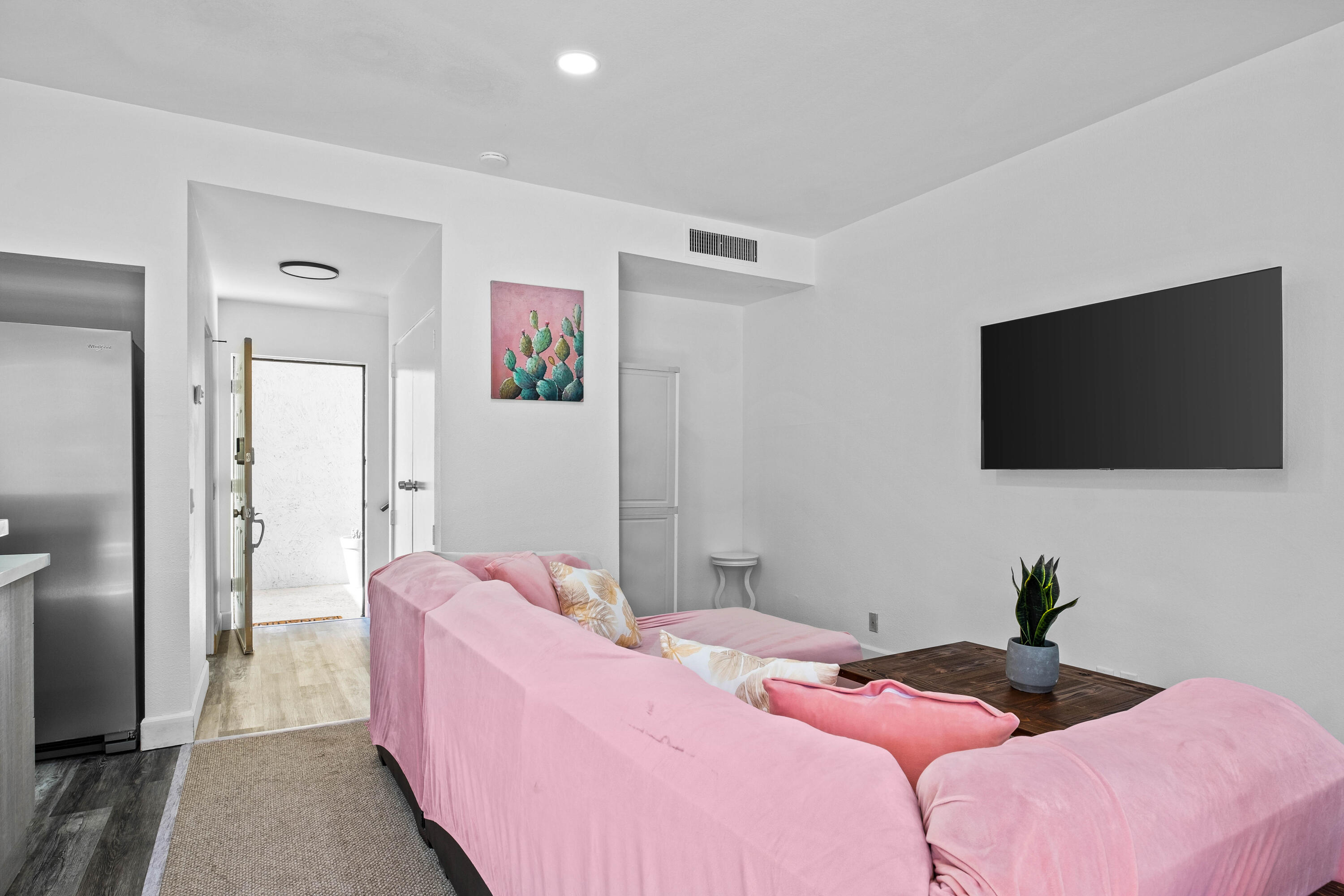 78130 Cortez Lane, Unit 56 Indian Wells, CA 92210 - Photo 18 of 31 a bedroom with a bed and a flat screen tv