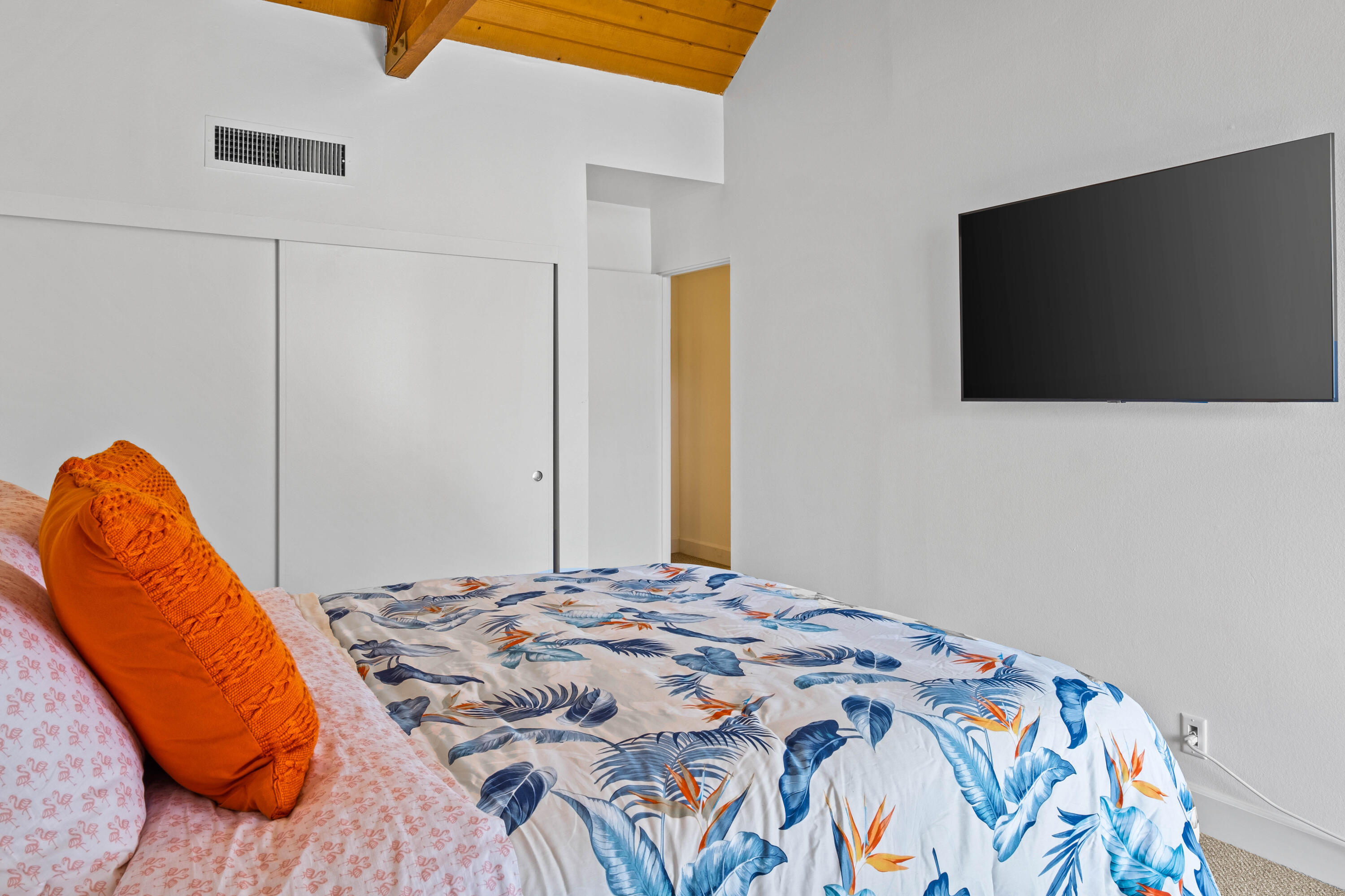 78130 Cortez Lane, Unit 56 Indian Wells, CA 92210 - Photo 24 of 31 a bedroom with a bed and a flat screen tv