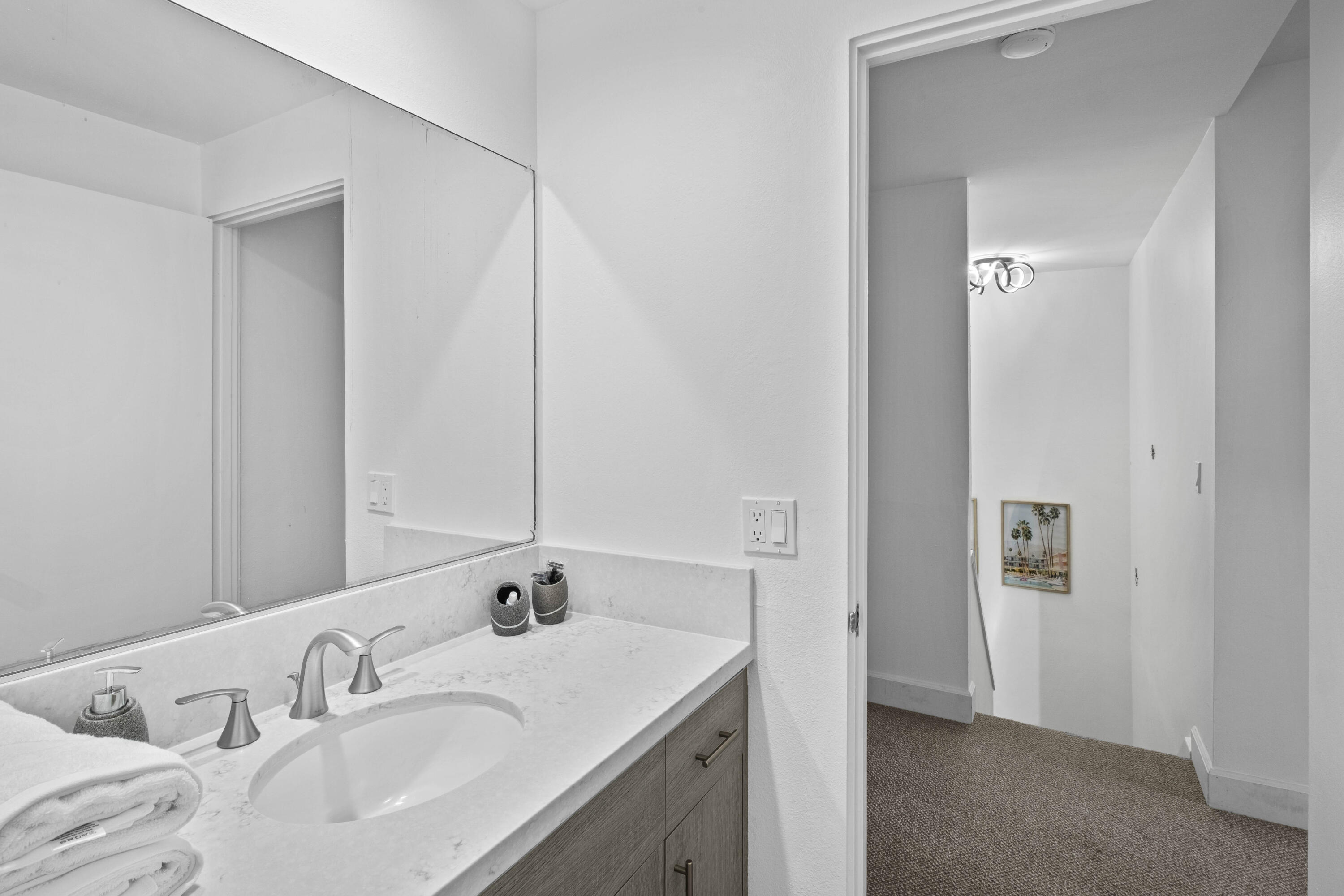 78130 Cortez Lane, Unit 56 Indian Wells, CA 92210 - Photo 10 of 31 a bathroom with a sink and a mirror