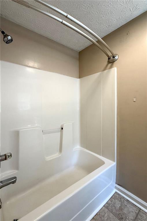 6258 Southern Magnolia Lane Lula, GA 30554 - Photo 14 of 17 a bathroom with a bathtub