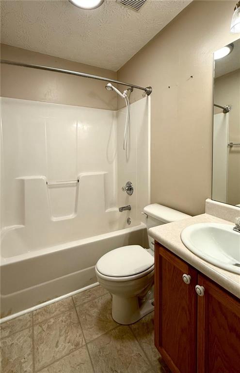 6258 Southern Magnolia Lane Lula, GA 30554 - Photo 9 of 17 a bathroom with a sink toilet and shower