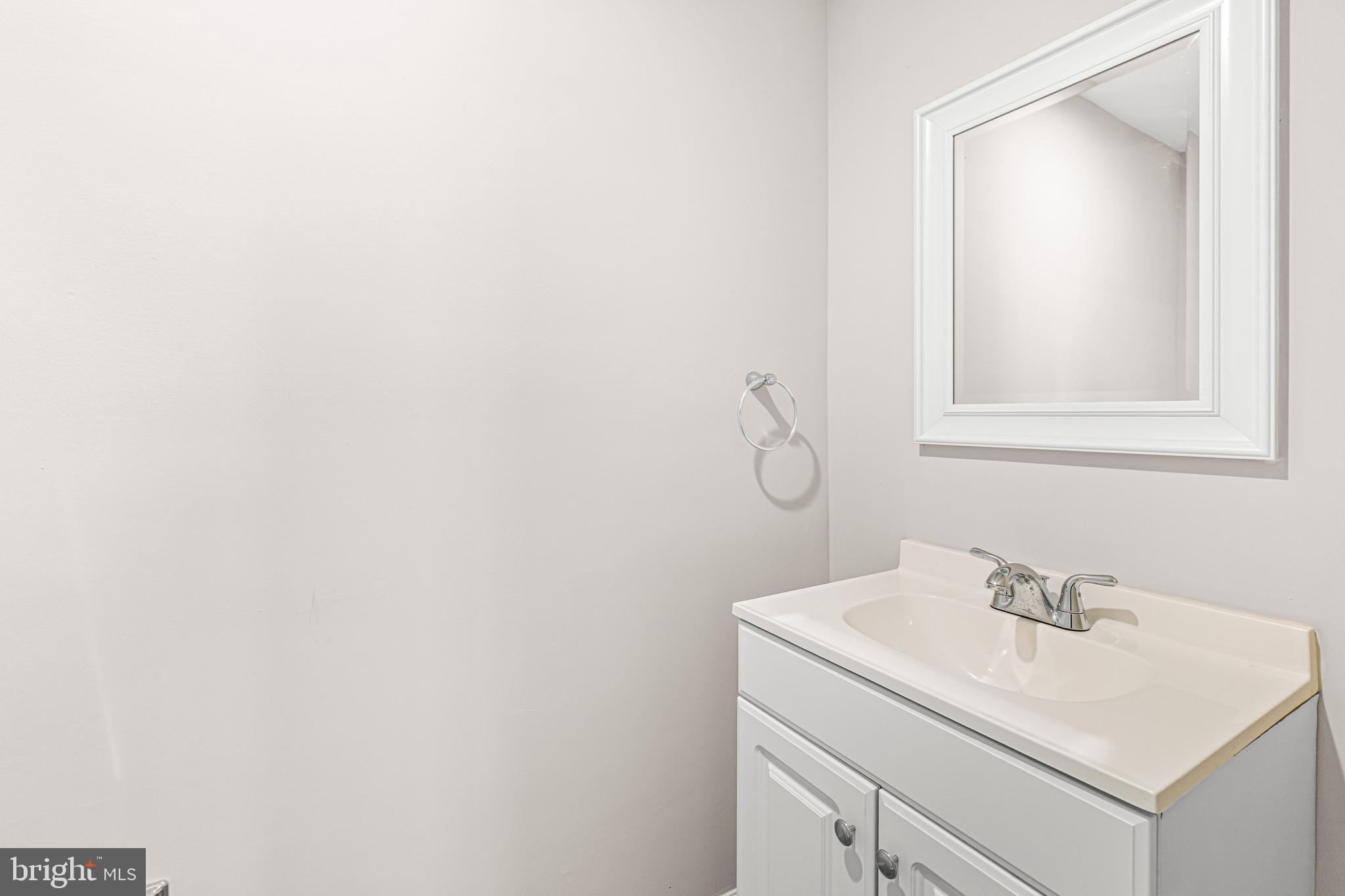 606 Summit Avenue Jenkintown, PA 19046 - Photo 12 of 27 a bathroom with a sink and a mirror