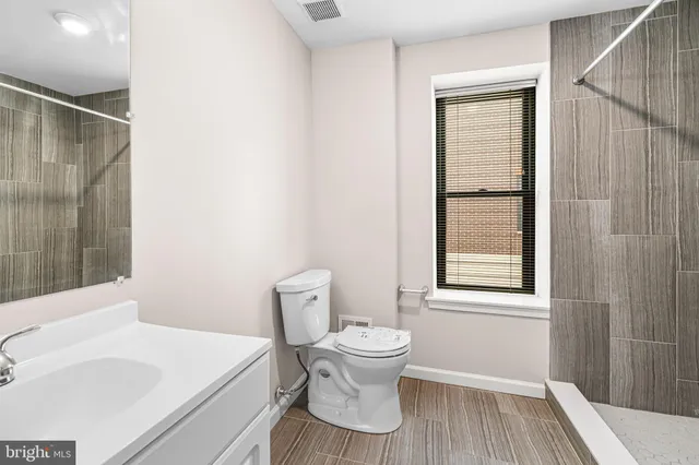 a view of a hallway with washer and dryer