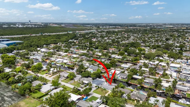 a view of multiple houses with outdoor space