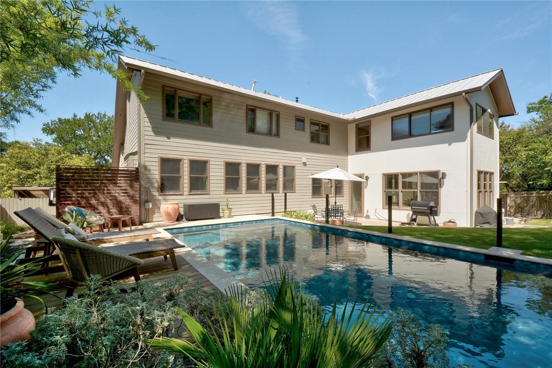 a swimming pool view with a outdoor space