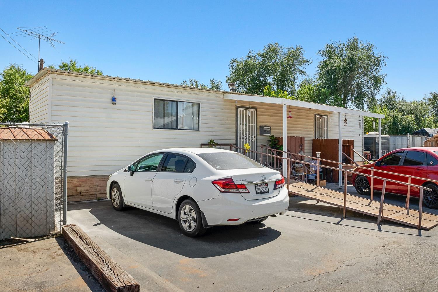 6837 Rio Linda Boulevard Rio Linda, CA 95673 - Photo 35 of 51 a car parked in front of a house